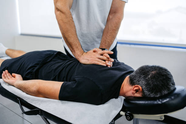 What role does posture play in maintaining spinal alignment in Carrollton, TX?